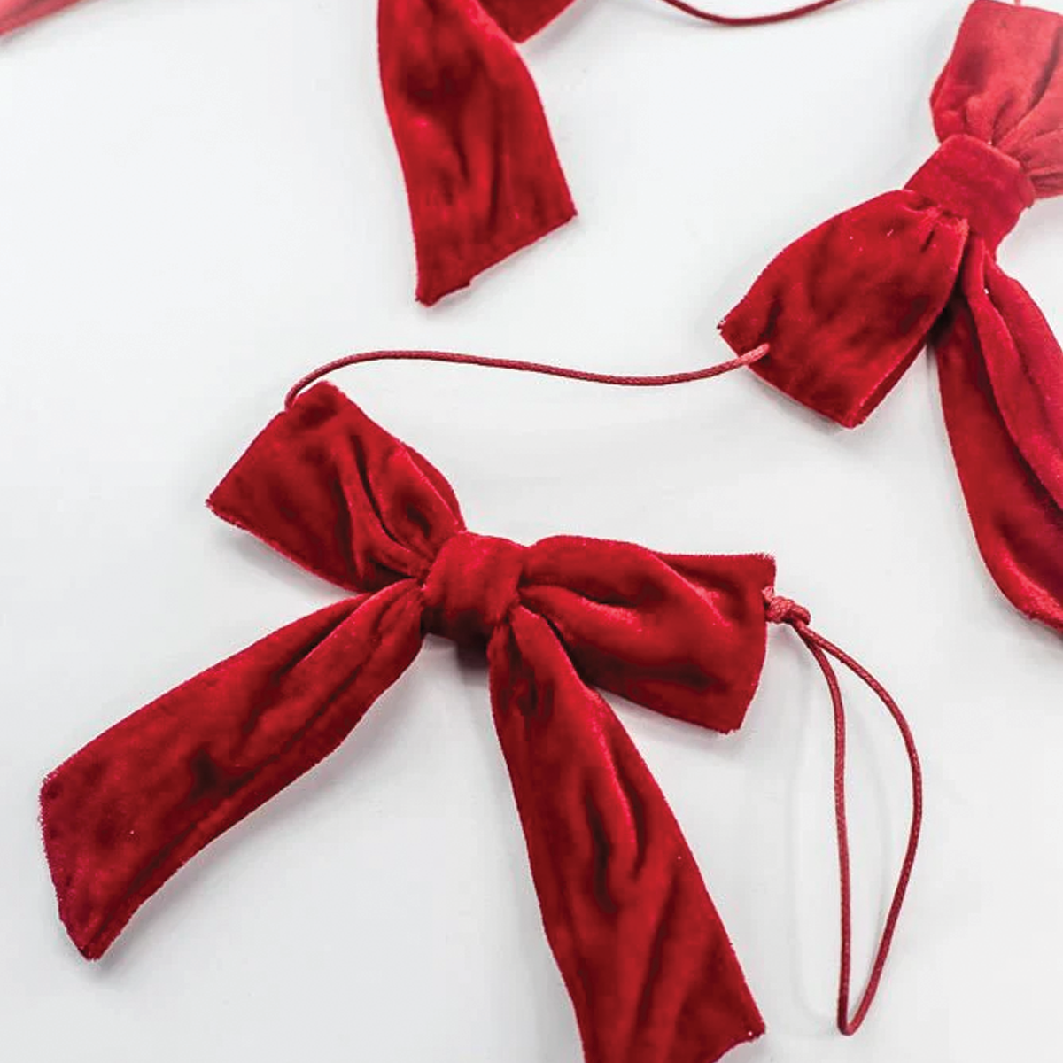 5ft. Red Velvet Bow Garland Branches Designs