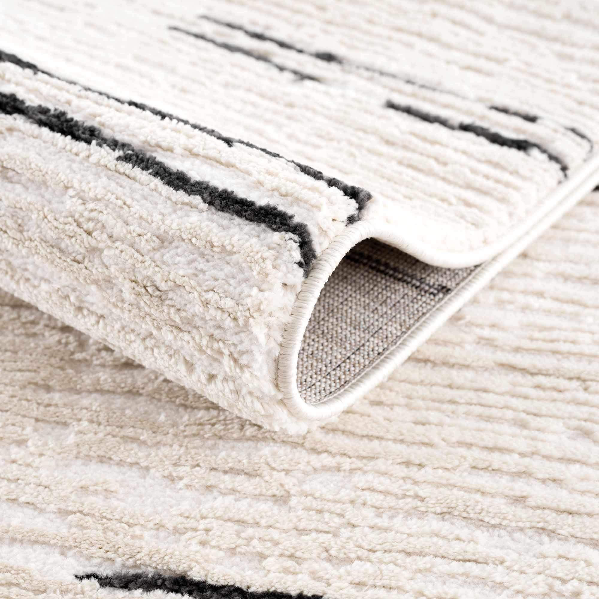 Riad Black Striped White Rug with Tassels Boutique Rugs