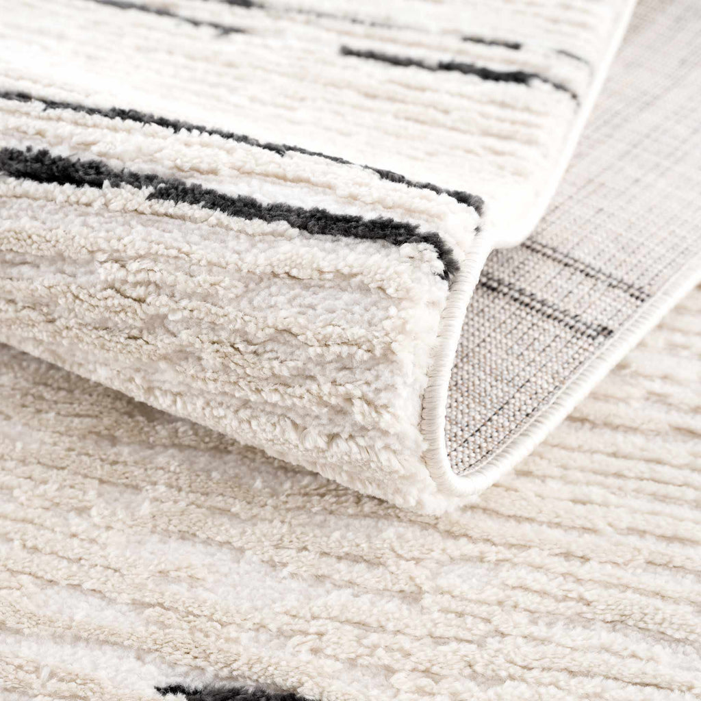 Riad Black Striped White Rug with Tassels Boutique Rugs