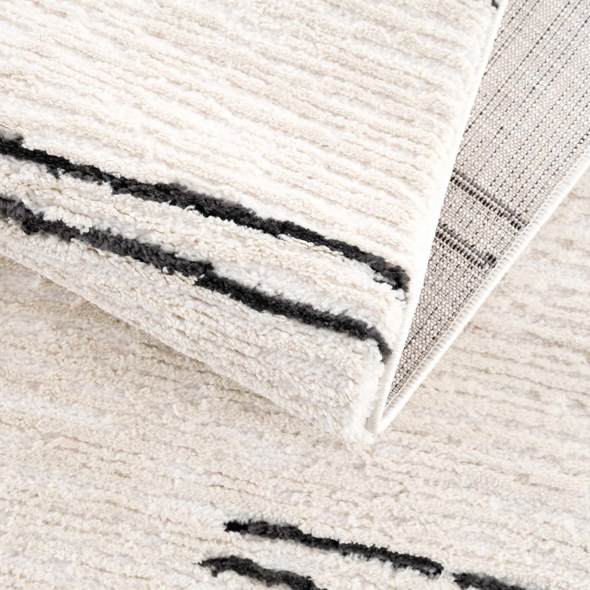 Riad Black Striped White Rug with Tassels Boutique Rugs