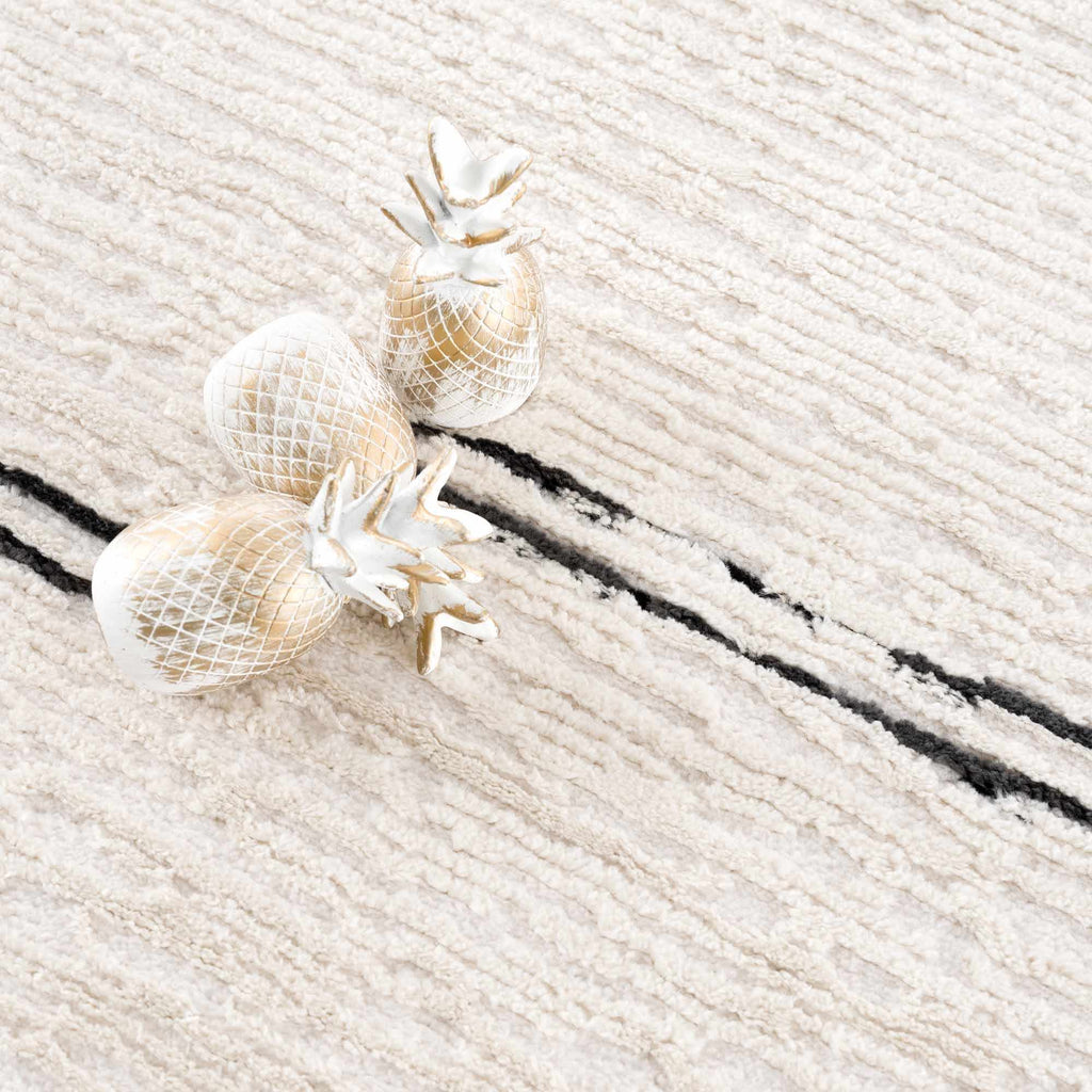 Riad Black Striped White Rug with Tassels Boutique Rugs