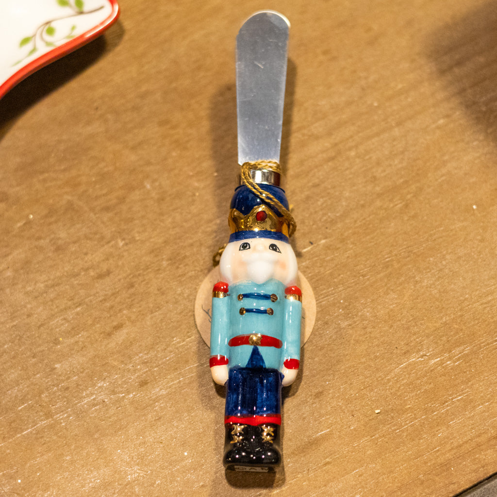 Light Blue Jacket Metal Nutcracker Spreader Branches Designs