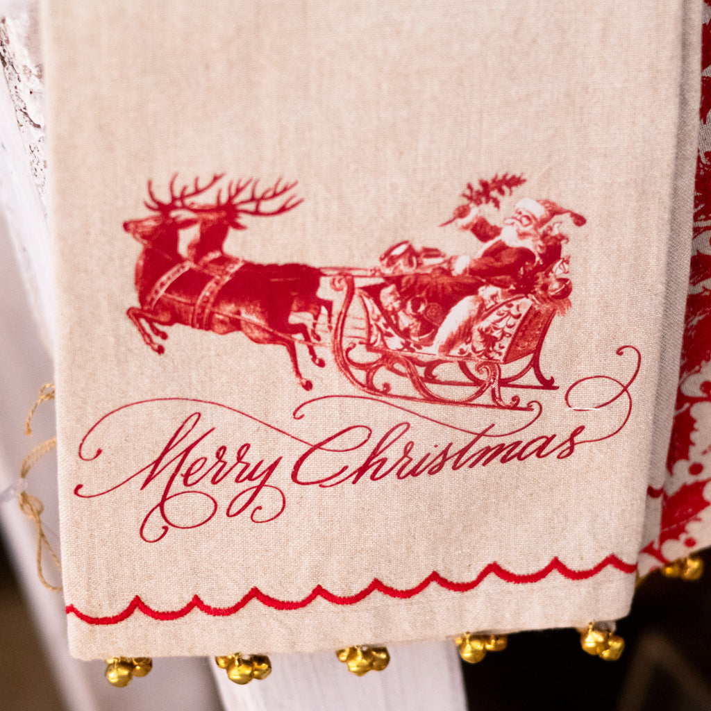 Yuletide Santa on Sleigh Towel with Brass Bells Branches Designs