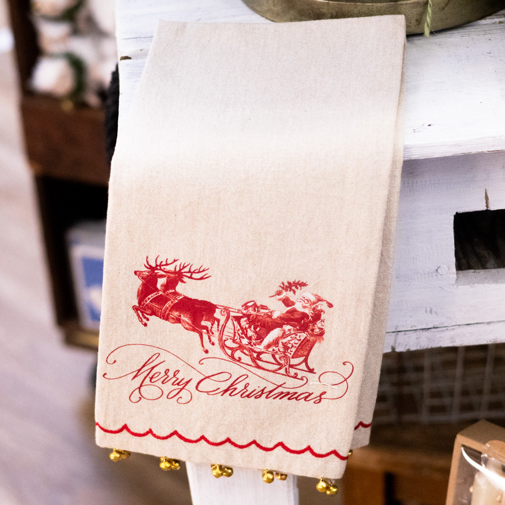 Yuletide Santa on Sleigh Towel with Brass Bells Branches Designs