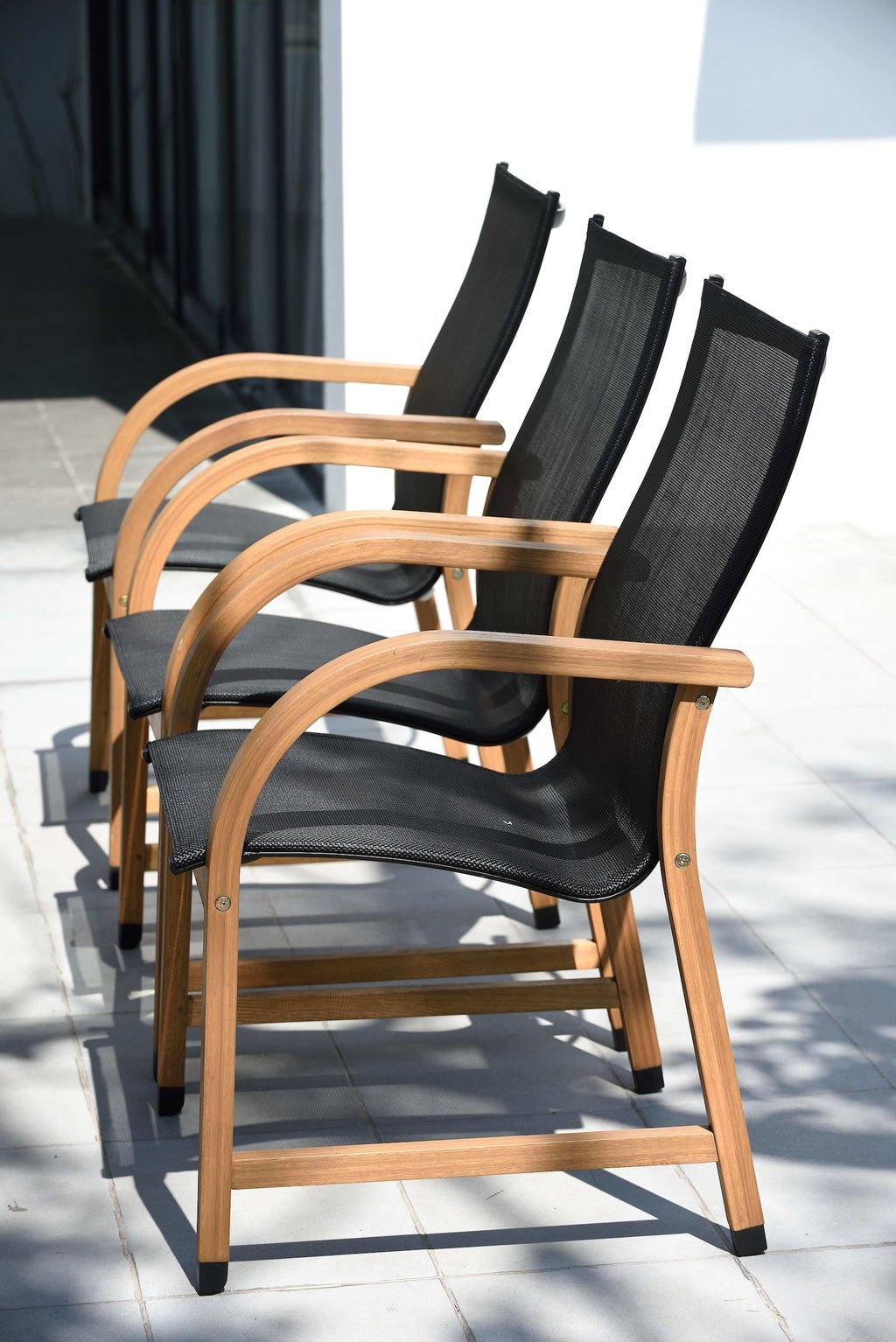 Oldbury Round Table and 4 Manhattan Black Armchair Dining Set LifestyleGarden US