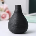 Simple Small Black Ceramic Vase DECORBITES