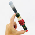 Red Jacket Ceramic Metal Nutcracker Spreader Branches Designs