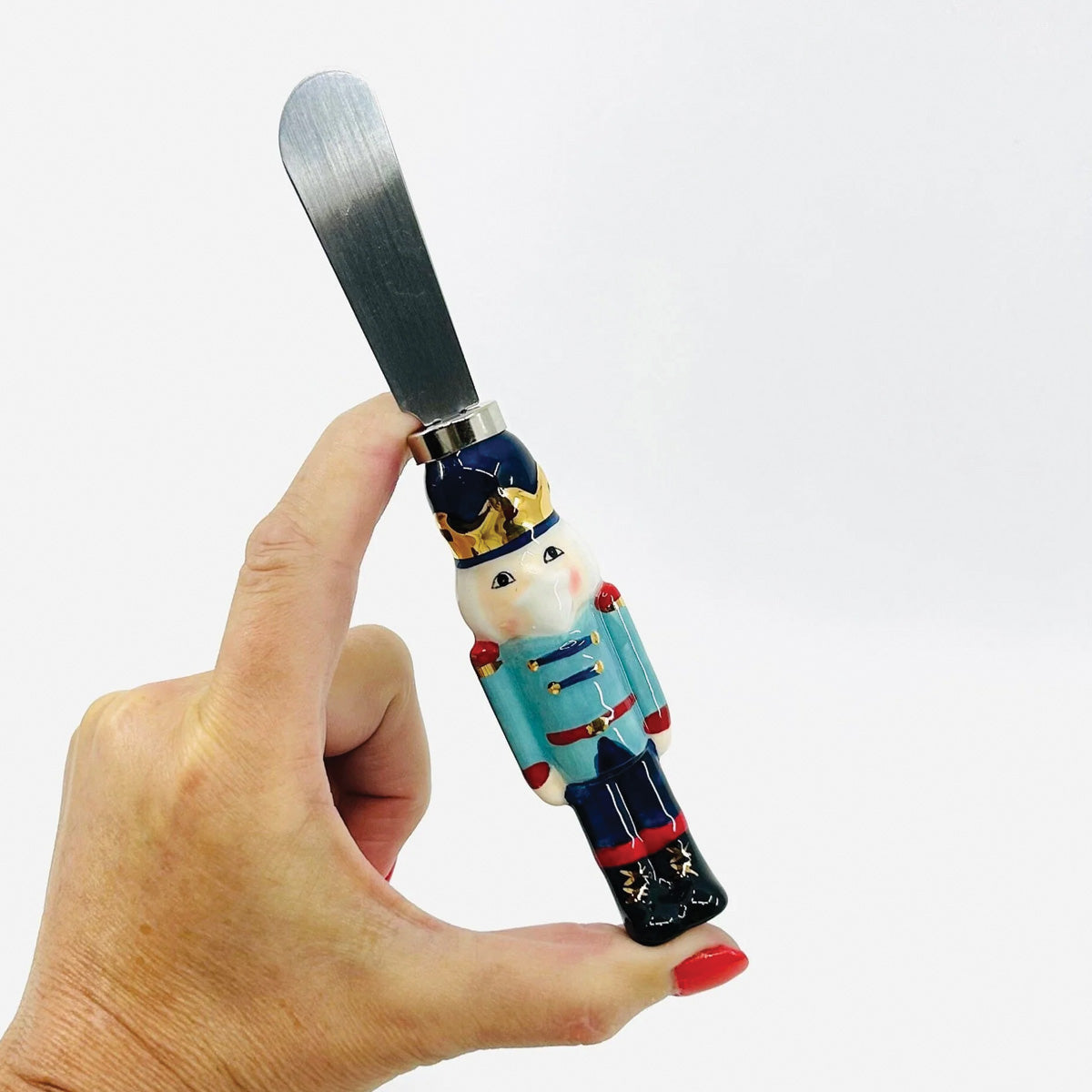 Light Blue Jacket Metal Nutcracker Spreader Branches Designs